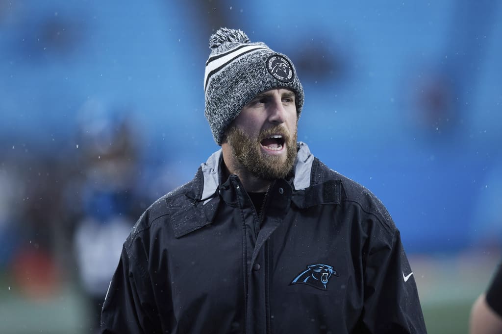Carolina Panthers assistant offensive line coach Robert Kugler works with the team during warm ups prior to an NFL football game against the Atlanta Falcons, Sunday, Dec. 17, 2023, in Charlotte, N.C. (AP Photo/Brian Westerholt)
