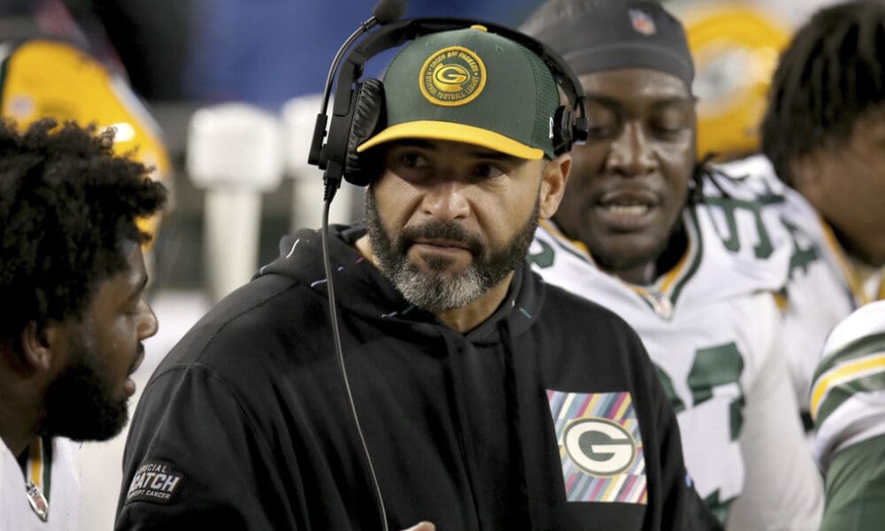 Green Bay Packers defensive line coach Jerry Montgomery sits on the sideline during an NFL divisional round playoff football game against the San Francisco 49ers Saturday, Jan. 20, 2024, in Santa Clara. Montgomery is reportedly joining the New England Patriots staff. (AP Photo/Scot Tucker)