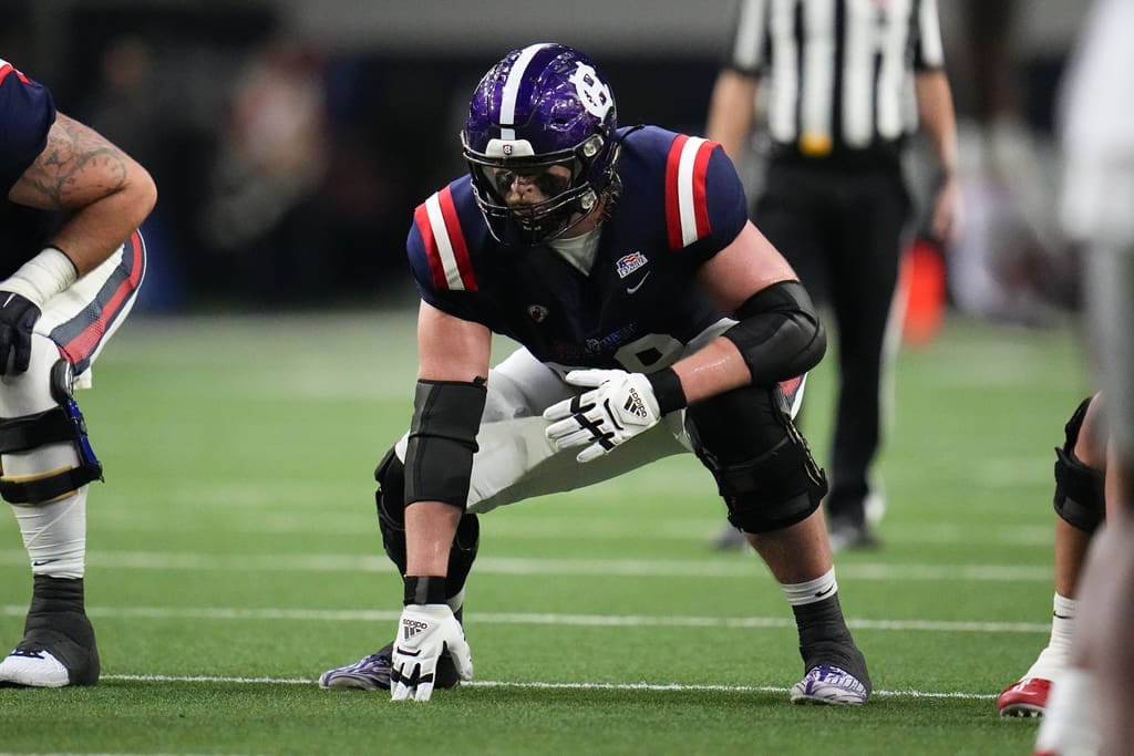 West's CJ Hanson, of Holy Cross, participates in the East West Shrine Bowl NCAA college football game in Frisco, Texas, Thursday, Feb. 1, 2024. (AP Photo/Julio Cortez)