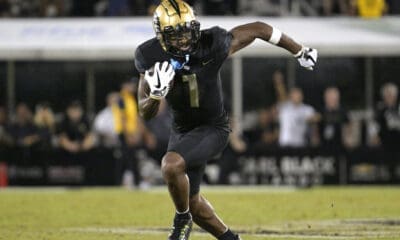 Patriots draft target, Central Florida wide receiver Javon Baker (1) runs after catching a pass during the second half of an NCAA college football game against Louisville on Friday, Sept. 9, 2022, in Orlando, Fla. (AP Photo/Phelan M. Ebenhack)