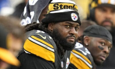 Pittsburgh Steelers defensive tackle Armon Watts, center, sits on the sideline during the second half of an NFL football game against the Jacksonville Jaguars in Pittsburgh, Sunday, Oct. 29, 2023. (AP Photo/Gene J. Puskar)