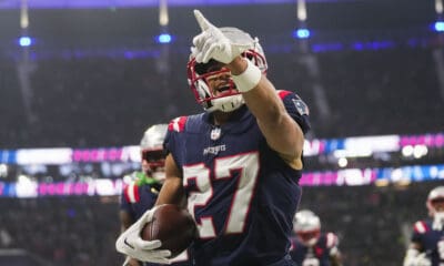 New England Patriots cornerback Myles Bryant (27) celebrates his interception in the second half of an NFL football game against the Indianapolis Colts in Frankfurt, Germany Sunday, Nov. 12, 2023. (AP Photo/Michael Probst)