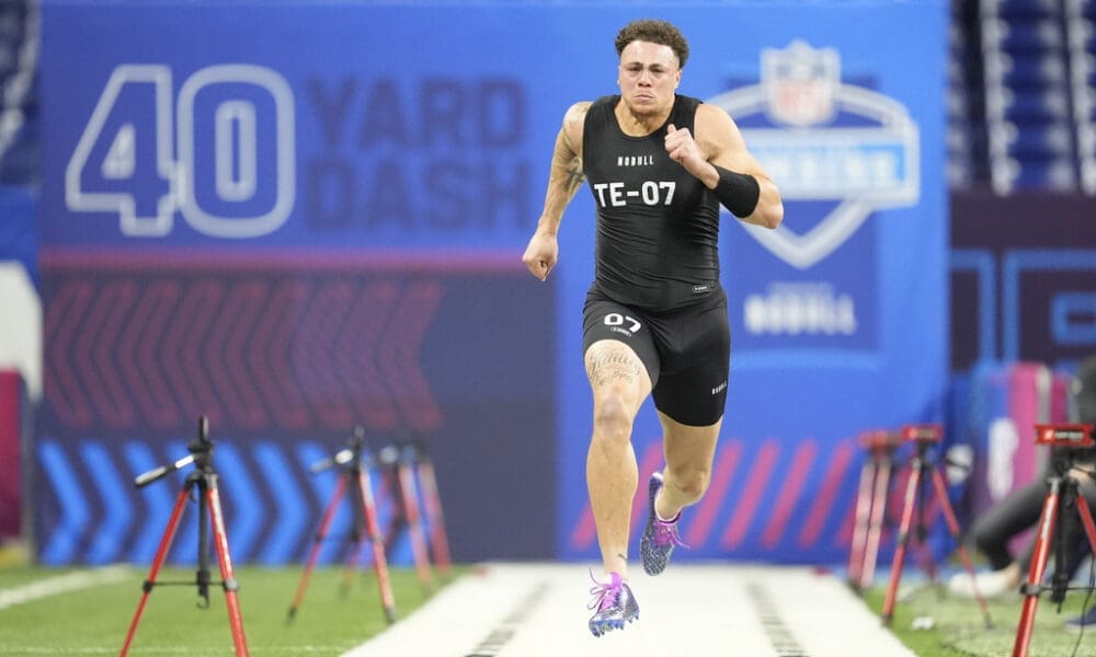 Penn State tight end Theo Johnson runs the 40-yard dash at the NFL football scouting combine, Friday, March 1, 2024, in Indianapolis. Johnson is one of the top tight ends available in the 2024 NFL Draft. (AP Photo/Michael Conroy)