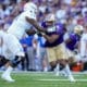 Washington edge Bralen Trice in action against Tulsa offensive lineman Darrell Simpson (79) during an NCAA college football game Saturday, Sept. 9, 2023, in Seattle. (AP Photo/Lindsey Wasson)