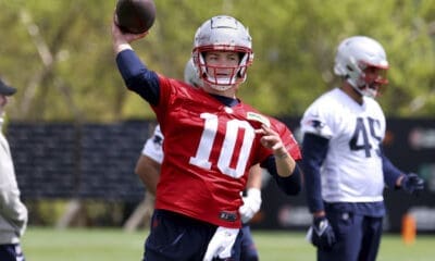 New England Patriots first round quarterback draft pick Drake Maye (10) throws the ball during the NFL football team's rookie minicamp Saturday, May 11, 2024, in Foxborough, Mass. (AP Photo/Mark Stockwell)