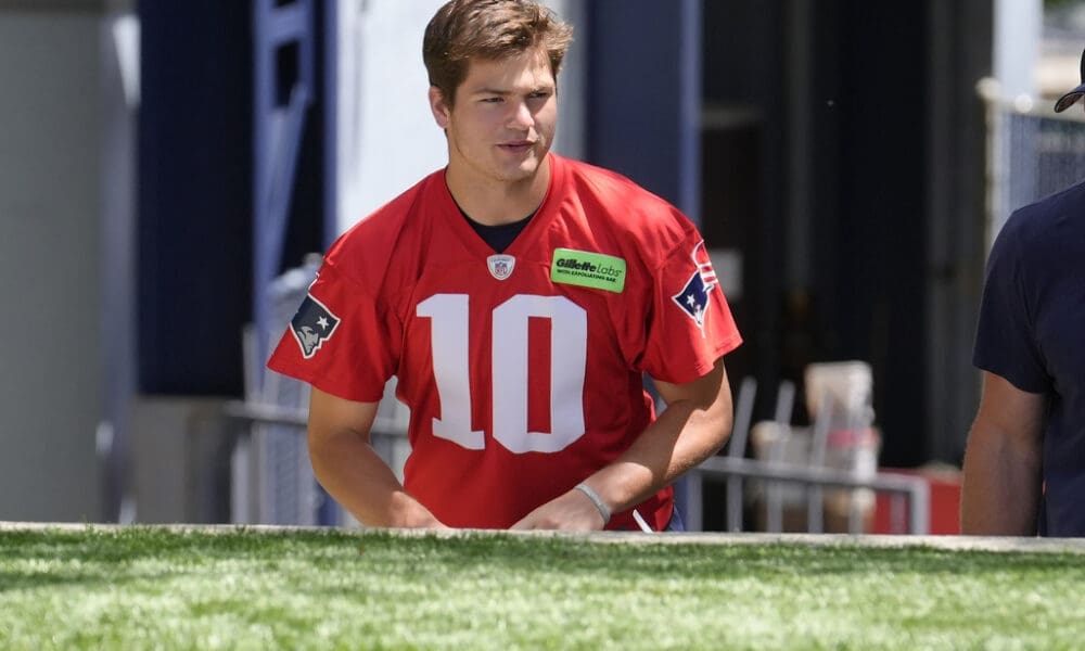 New England Patriots quarterback Drake Maye (10) steps on the field for an NFL football practice, Wednesday, May 29, 2024, in Foxborough, Mass. (AP Photo/Steven Senne)