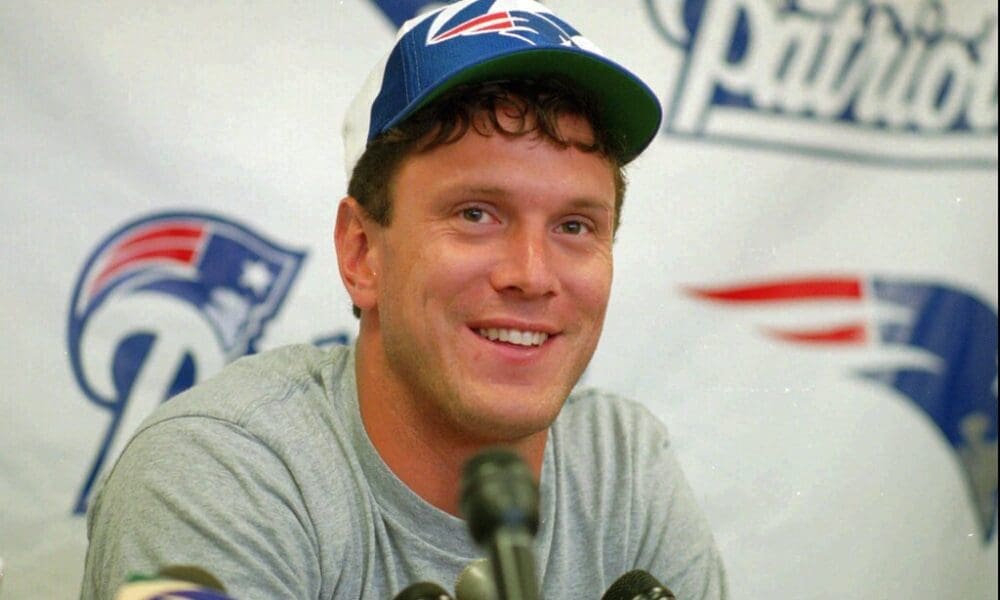 FILE--This is a July 1995 file photo of New England Patriots quarterback Drew Bledsoe, who ended last season by throwing four straight incompletetions in a a 20-13 playoff loss to the Cleveland Browns. Bledsoe will face Cleveland again in the Patriots season opener Sunday Sept. 3, 1995 in Foxboro, Mass. Bledsoe recently commented on how the New England Patriots will approach the development of rookie QB Drake Maye (AP Photo/Mark E. Johnson)