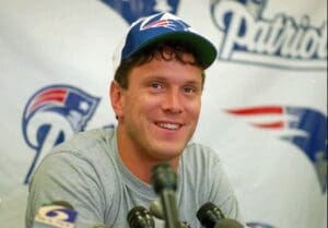 FILE--This is a July 1995 file photo of New England Patriots quarterback Drew Bledsoe, who ended last season by throwing four straight incompletetions in a a 20-13 playoff loss to the Cleveland Browns. Bledsoe will face Cleveland again in the Patriots season opener Sunday Sept. 3, 1995 in Foxboro, Mass. Bledsoe recently commented on how the New England Patriots will approach the development of rookie QB Drake Maye (AP Photo/Mark E. Johnson)