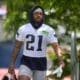 New England Patriots running back Antonio Gibson (21) steps on the field for an NFL football practice, Wednesday, May 29, 2024, in Foxborough, Mass. (AP Photo/Steven Senne)