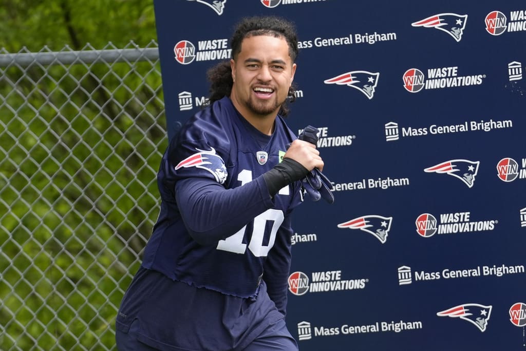 New England Patriots linebacker Sione Takitaki (16) steps on the field before an NFL football practice, Monday, May 20, 2024, in Foxborough, Mass. (AP Photo/Steven Senne)