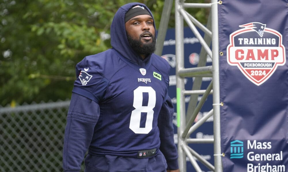 New England Patriots linebacker Ja'Whaun Bentley (8) steps on the field before an NFL football training camp, Wednesday, July 24, 2024, in Foxborough, Mass. (AP Photo/Steven Senne)