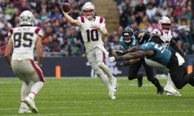 New England Patriots quarterback Drake Maye (10) passes the ball against the Jacksonville Jaguars during an NFL football game at Wembley Stadium, Sunday, Oct. 20, 2024, in London. (AP Photo/Steve Luciano)