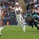 New England Patriots quarterback Drake Maye (10) passes the ball against the Jacksonville Jaguars during an NFL football game at Wembley Stadium, Sunday, Oct. 20, 2024, in London. (AP Photo/Steve Luciano)