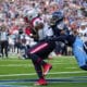 New England Patriots running back Rhamondre Stevenson (38) makes a catch in front of Tennessee Titans cornerback Darrell Baker Jr. (39) for a touchdown at the end of the fourth quarter of an NFL football game in Nashville, Tenn., Sunday, Nov. 3, 2024. (AP Photo/George Walker IV)