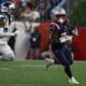 New England Patriots' Terrell Jennings runs the ball against the Carolina Panthers during an NFL preseason football game at Gillette Stadium, Thursday, Aug. 8, 2024 in Foxborough, Mass. (Winslow Townson/AP Images for Panini)