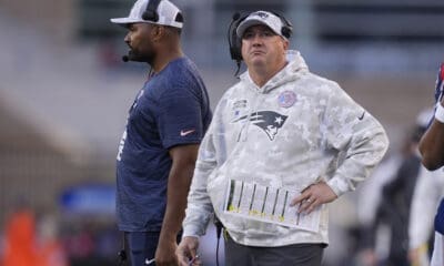 New England Patriots offensive coordinator Alex Van Pelt, right, stands with head coach Jerod Mayo during the second half of an NFL football game against the Los Angeles Rams, Sunday, Nov. 17, 2024, in Foxborough, Mass. (AP Photo/Michael Dwyer)