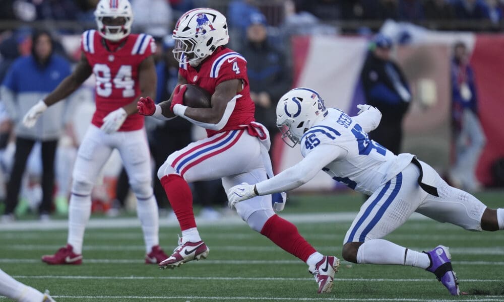 New England Patriots running back Antonio Gibson (4) runs during an NFL football game, Sunday, Dec. 1, 2024, in Foxborough, Mass. (AP Photo/Charles Krupa)